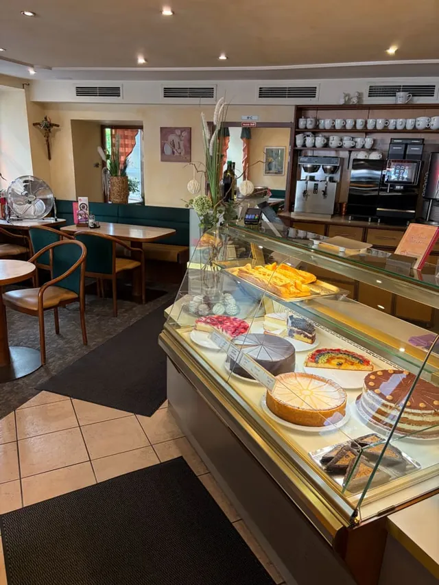 Our cake display in the café, with the coffee bar behind